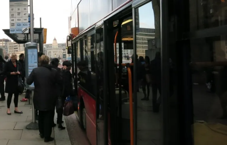Passengers boarding bus