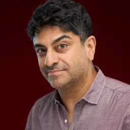 Photo of Ash Kotak looking towards the camera