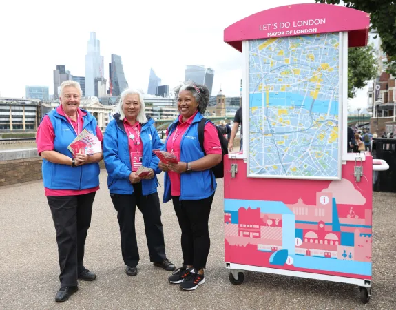 Team London Ambassadors providing information to people as part of Let's Do London campaign event