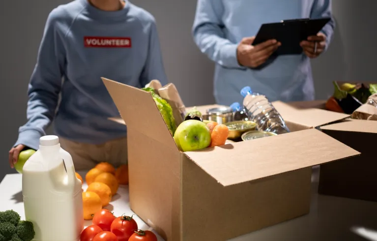 People volunteering at food bank