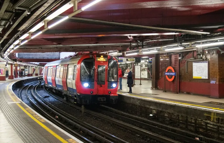 Underground train arriving at Baker Street station