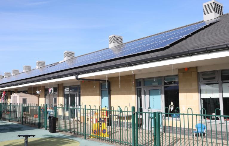 Solar panel mounted on the roof of school building