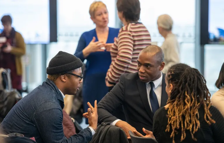Photo showing participants in discussion at a Community Sponsorship event
