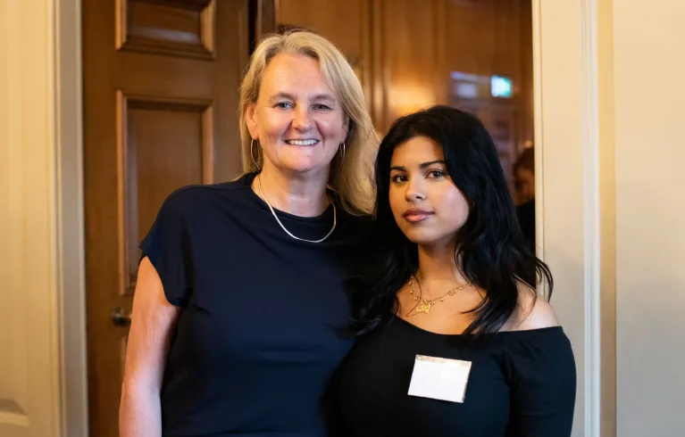 London VRU director standing with Young People's Action Group member.