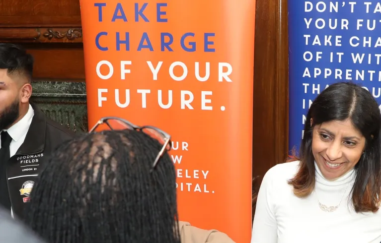 Two people chatting at 'Taking charge of your future' event