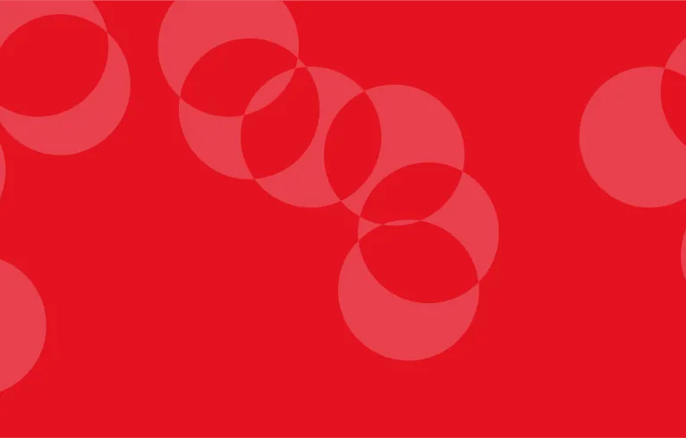 Light red circles on a red background