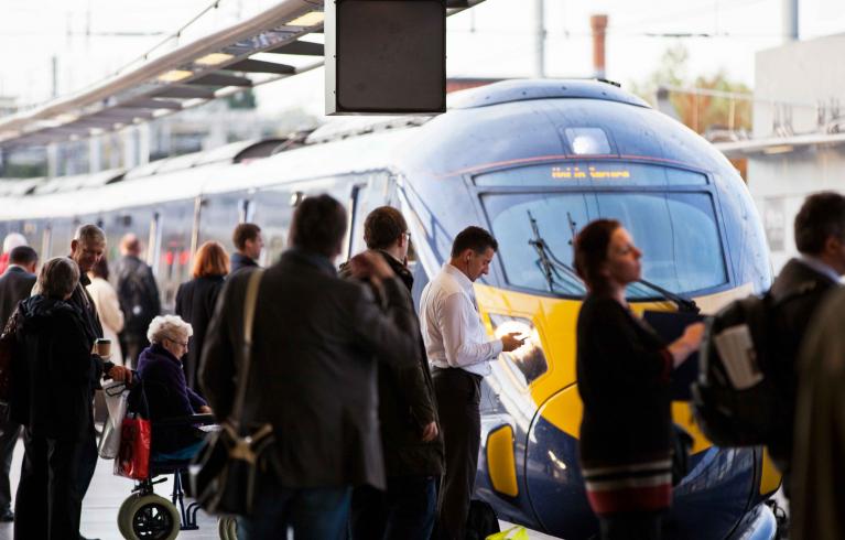 Commuters waiting on the platform for a train