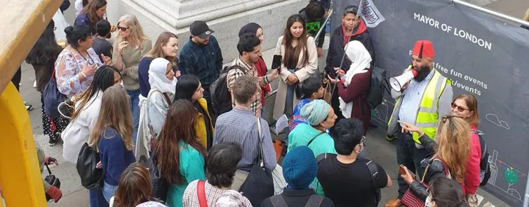 Abdul Maalik Tour group of people standing