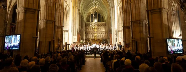 Choir singing carols in a church