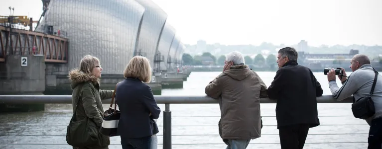 People looking at the Thames Barrier
