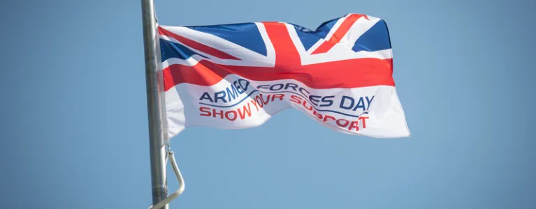 Image of Armed Forces Day Flag flying in the wind