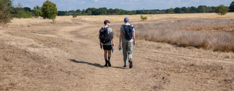 People walking through a London park