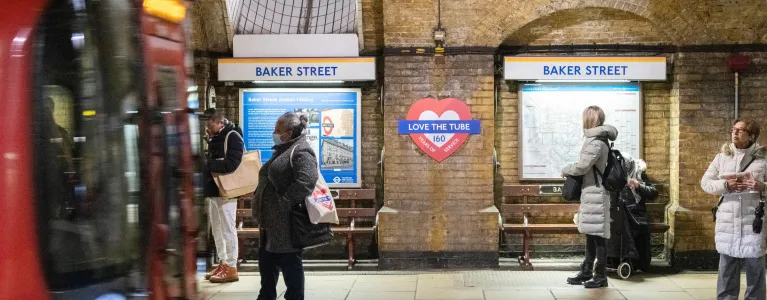 Tube train departing from Baker Street platform