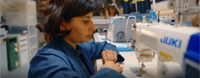 Pattern project's Shruti working at the sewing machine