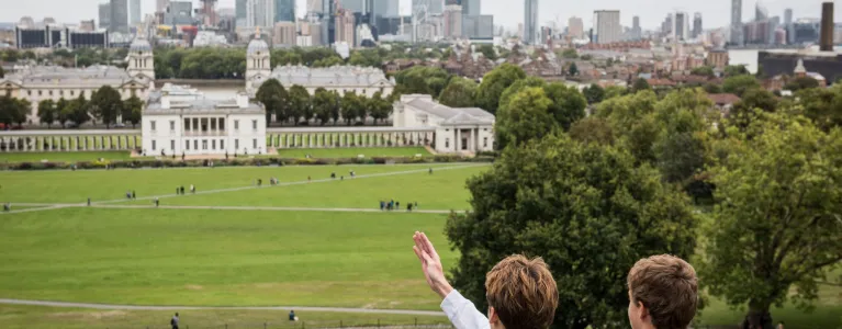 Londoner points to a green space in Greenwhich