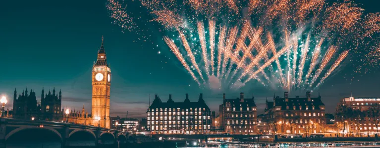 Colourful display of fireworks over London night sky and Big Ben