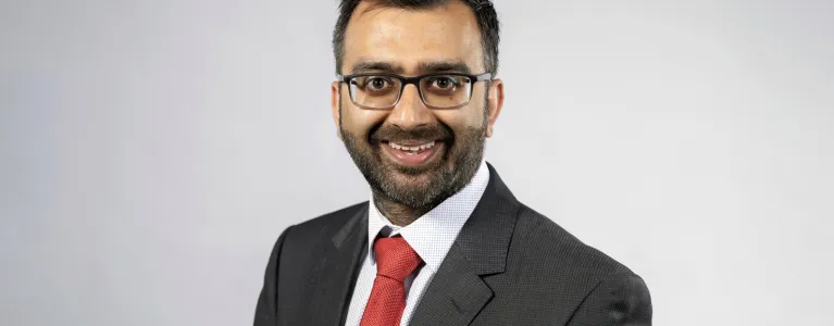 A headshot of Krupesh Hirani AM