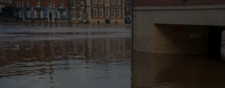 flooded road and houses