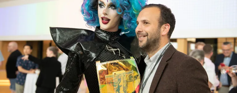 Zack Polanski AM stands posing for a photo at London's Pride Reception in 2023 in City Hall.