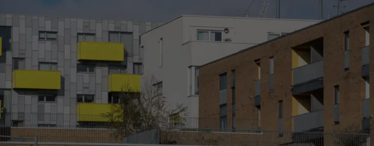 square flats with blue sky background