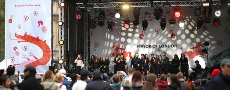 People standing around a stage