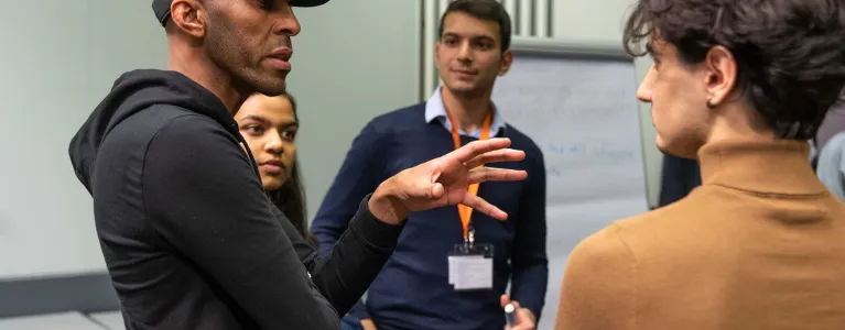 People talking at DMPC event