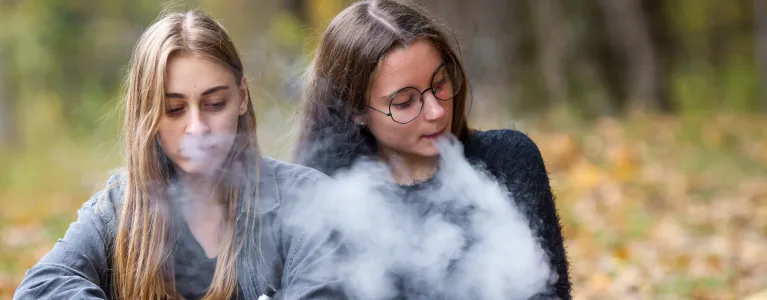 young girls vaping