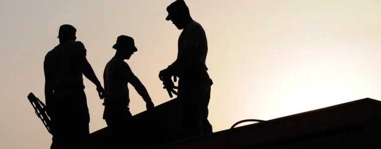 Construction workers silhouette