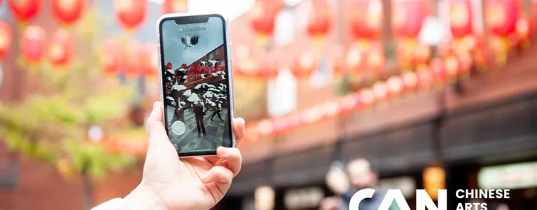 Person taking a picture using mobile phone