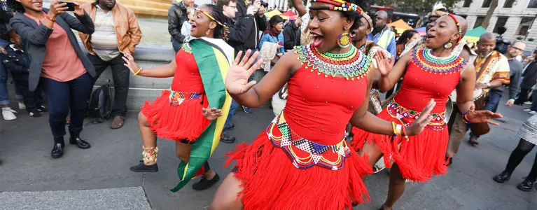 Dancer in red at Black History Month celebrations