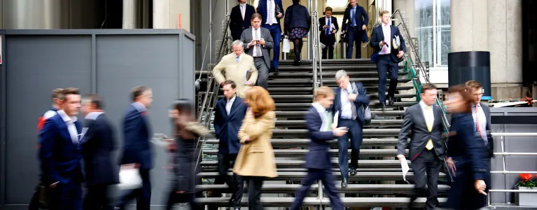 Business people walking on London street in the City