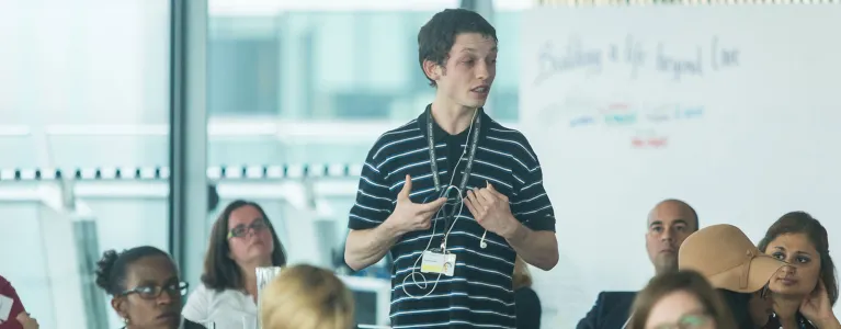 Young person speaking at meeting