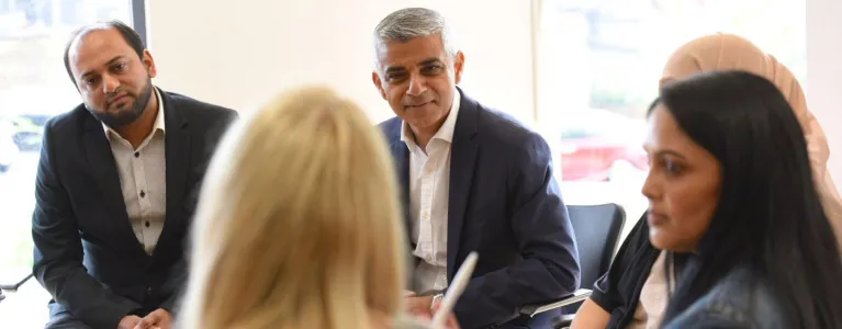 Mayor speaks with a community group at Blackwall Reach