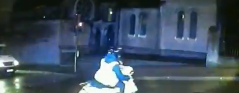 Met police officers pursue a moped shortly before making an arrest