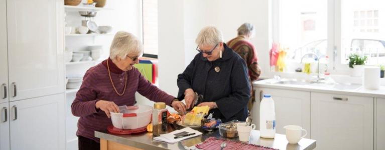 Older people cooking