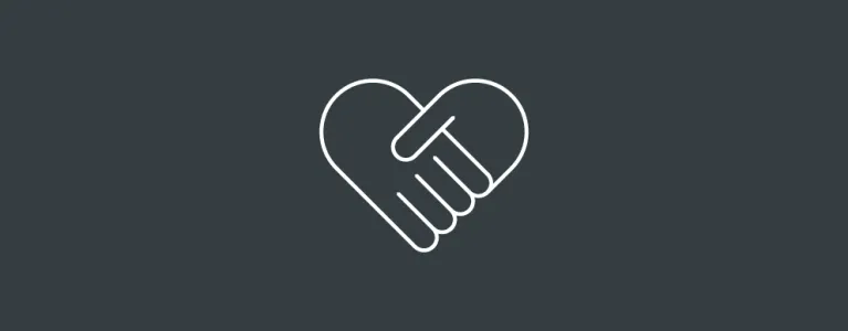 Two hands shake and form a heart representing a strong civil society