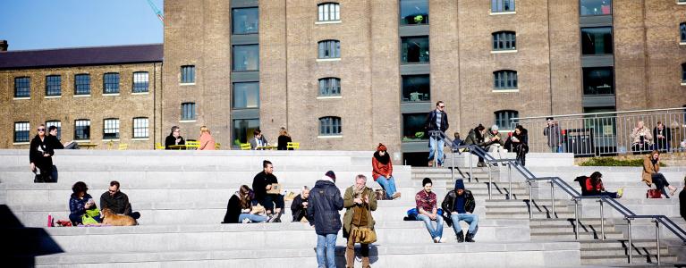People gathered outside on steps