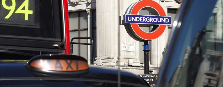 Bus, taxi and underground sign