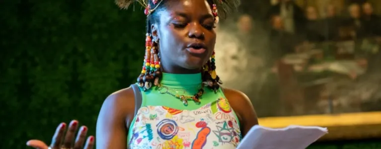 Tyreis Holder reading poem at 2.8m Minds event