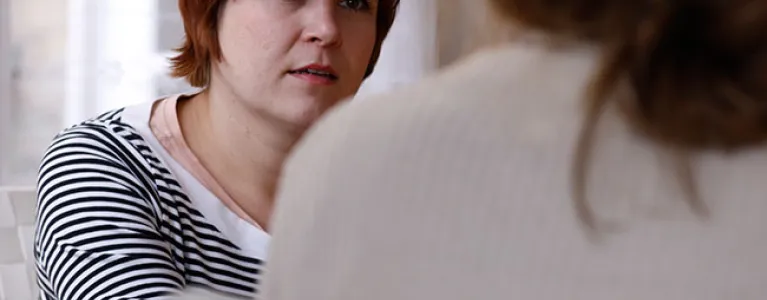 Two women in conversation