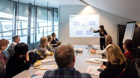 People at a meeting at LondonEd 2020