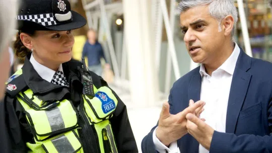 Sadiq Khan talking to police officer