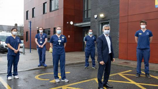 The Mayor and some doctors outside a vaccination site