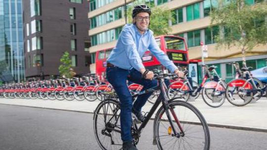 Will Norman on a bicycle