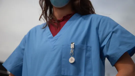 a nurse in a face mask