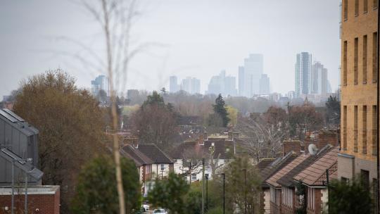 Houses and the London skyline.