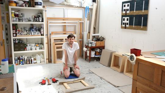 Artist in their studio in the Acton and Park Royal Creative Enterprise Zone 