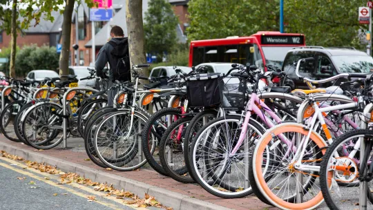 bicycles in a row locked up 