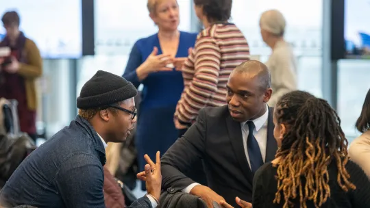 Photo showing participants in discussion at a Community Sponsorship event