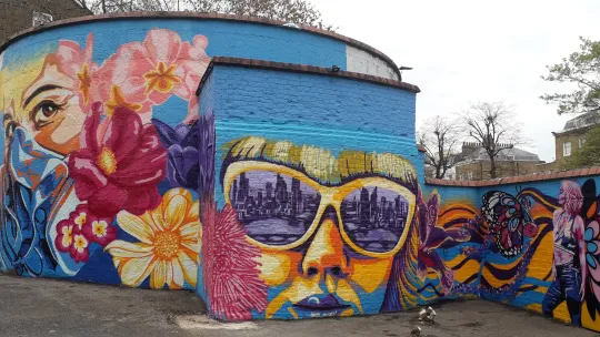 A mural painted on wall in Clapham, part of the Untold Stories project